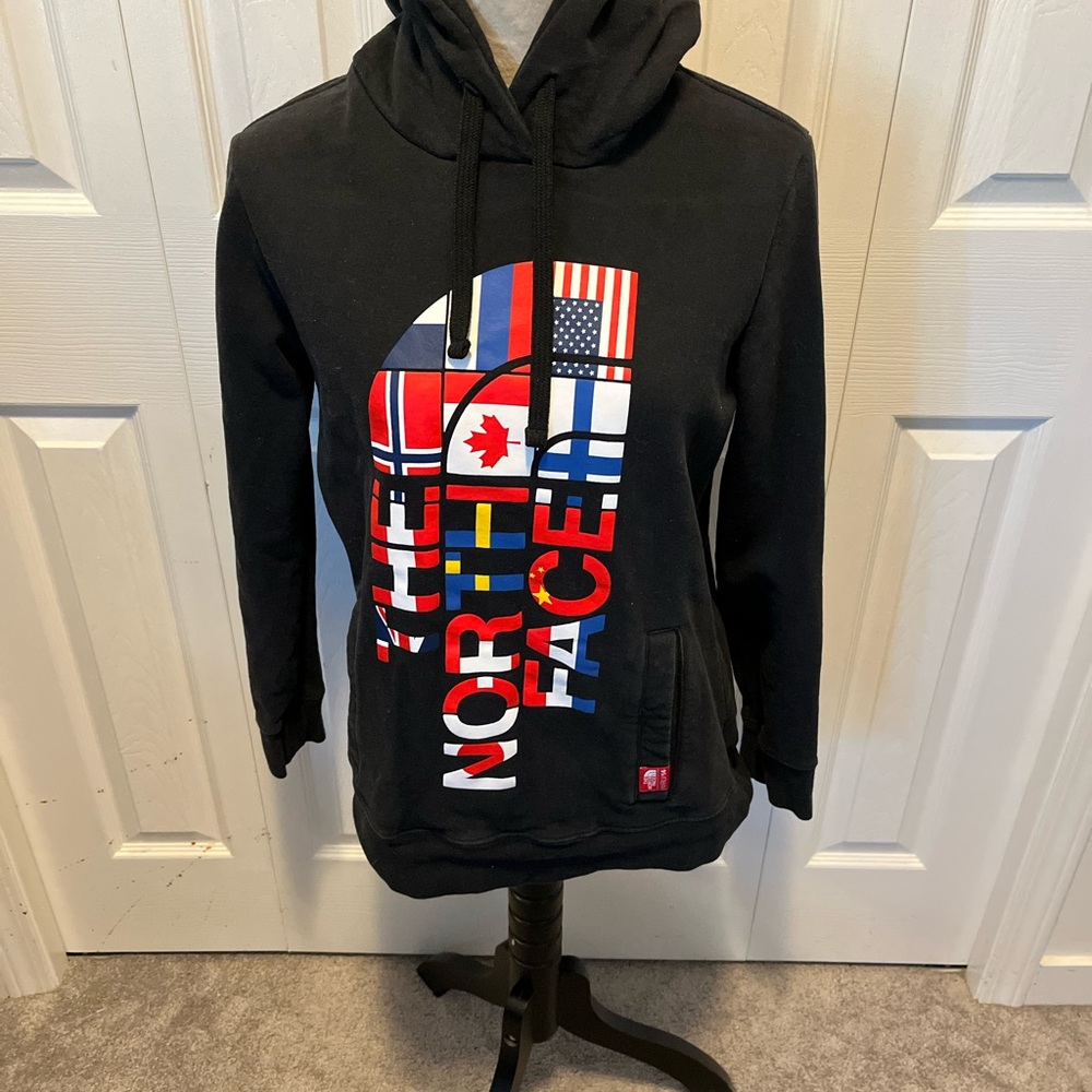 The North Face women’s  Black Hoodie with flags